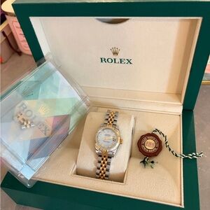 Rolex Women's Gold and Silver Watch